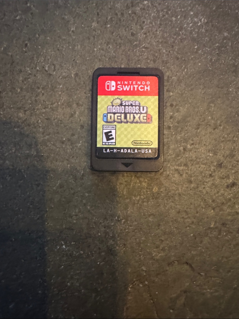Nintendo Switch Game Card with Red and Yellow Label - Super Mario Bros. U Deluxe